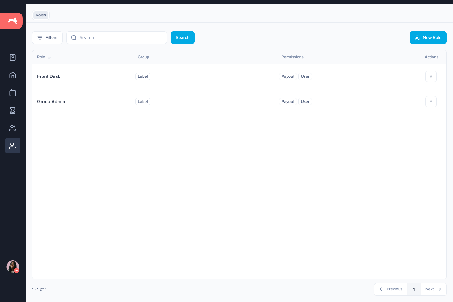 Roles table showing two existing roles (Front Desk, Group Admin) with Group label chips, permission chips (Payout, User), and per-row Actions menu. A New Role primary CTA sits in the top right.